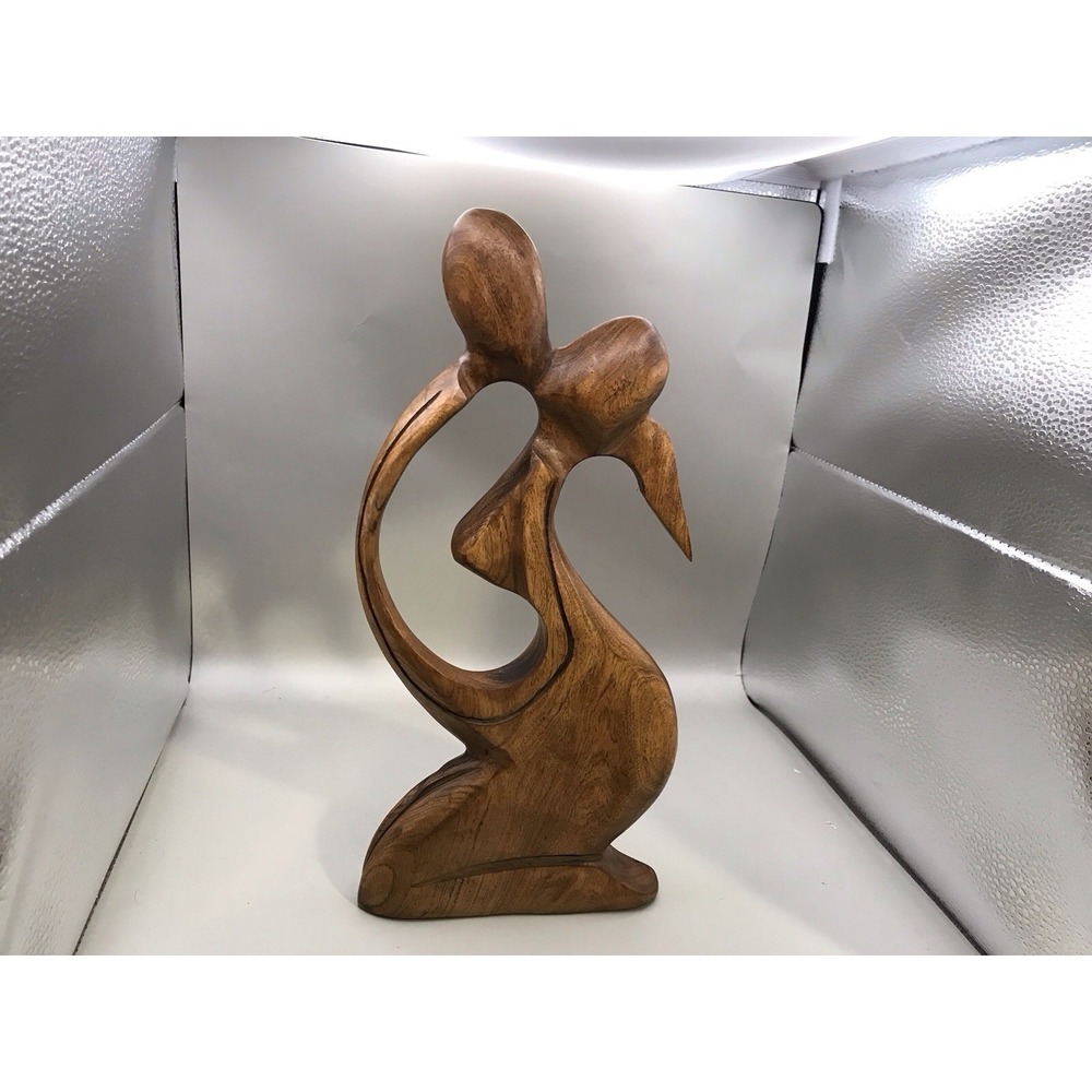 Hand Carved Abstract Sculpture From Wood Of A Kissing Couple